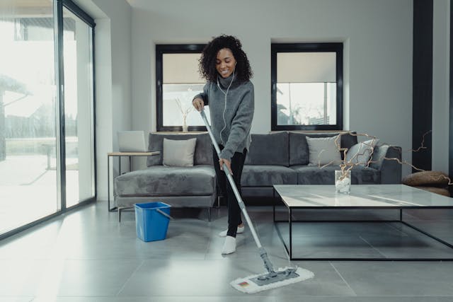 person cleaning floor